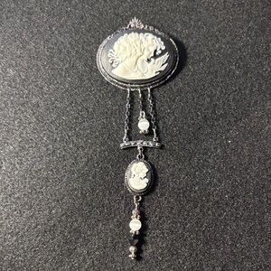 Elegant Silver and White Cameo Brooch